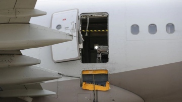 Photo: Man who opened Asiana plane door in mid-air tells police he was 'uncomfortable,' Yonhap reports